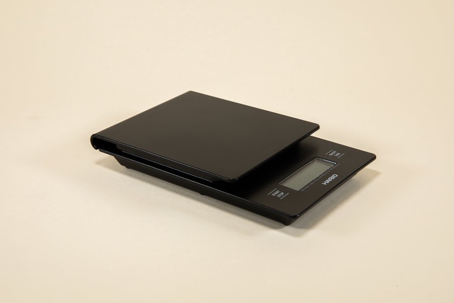 Hario V60 Drip Scale, a slim black scale with a timer